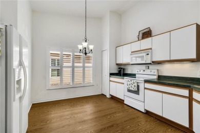 Welcome to this beautifully maintained 2-bedroom, 2-bath home on Stonegate Golf Club in Florida - for sale on GolfHomes.com, golf home, golf lot