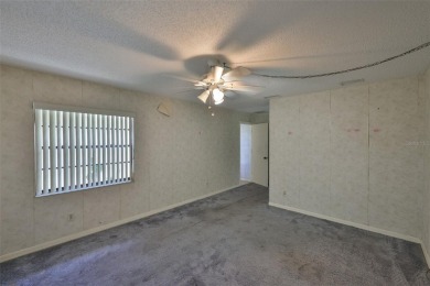 GREAT INVESTMENT OPPORTUNITY - FIXER UPPER IN SUN CITY CENTER! on Caloosa Greens Executive Golf Course in Florida - for sale on GolfHomes.com, golf home, golf lot