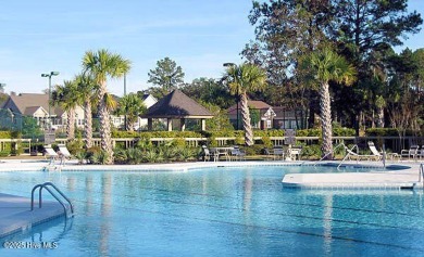 Awesome building lot with golf and pond views from your on Ocean Ridge Plantation in North Carolina - for sale on GolfHomes.com, golf home, golf lot