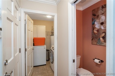 Located in the desirable Kings Grant golf community with no HOA on Kings Grant Golf and Country Club in North Carolina - for sale on GolfHomes.com, golf home, golf lot