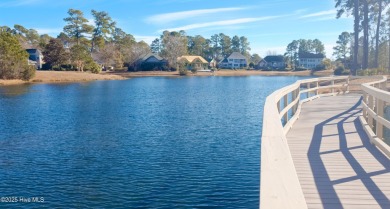 Awesome building lot with golf and pond views from your on Ocean Ridge Plantation in North Carolina - for sale on GolfHomes.com, golf home, golf lot
