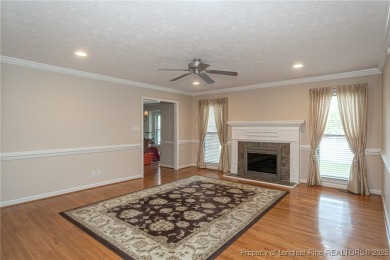Located in the desirable Kings Grant golf community with no HOA on Kings Grant Golf and Country Club in North Carolina - for sale on GolfHomes.com, golf home, golf lot