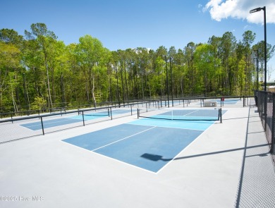 Awesome building lot with golf and pond views from your on Ocean Ridge Plantation in North Carolina - for sale on GolfHomes.com, golf home, golf lot