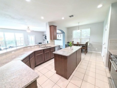 Welcome to this beautifully maintained 4-bedroom, 3.5-bathroom on Frisco Lakes Golf Course in Texas - for sale on GolfHomes.com, golf home, golf lot
