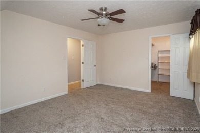 Located in the desirable Kings Grant golf community with no HOA on Kings Grant Golf and Country Club in North Carolina - for sale on GolfHomes.com, golf home, golf lot