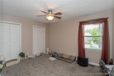 Located in the desirable Kings Grant golf community with no HOA on Kings Grant Golf and Country Club in North Carolina - for sale on GolfHomes.com, golf home, golf lot