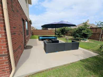 Welcome to this beautifully maintained 4-bedroom, 3.5-bathroom on Frisco Lakes Golf Course in Texas - for sale on GolfHomes.com, golf home, golf lot