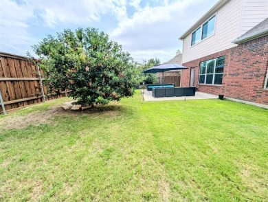 Welcome to this beautifully maintained 4-bedroom, 3.5-bathroom on Frisco Lakes Golf Course in Texas - for sale on GolfHomes.com, golf home, golf lot