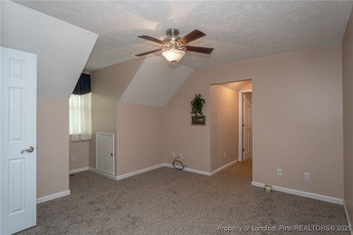 Located in the desirable Kings Grant golf community with no HOA on Kings Grant Golf and Country Club in North Carolina - for sale on GolfHomes.com, golf home, golf lot
