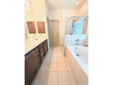 Welcome to this beautifully maintained 4-bedroom, 3.5-bathroom on Frisco Lakes Golf Course in Texas - for sale on GolfHomes.com, golf home, golf lot