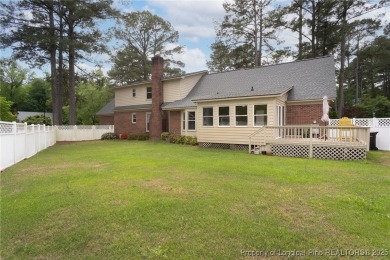 Located in the desirable Kings Grant golf community with no HOA on Kings Grant Golf and Country Club in North Carolina - for sale on GolfHomes.com, golf home, golf lot