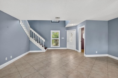 Welcome to Starlight Cove! This spacious 3 bed, 2.5 bath home on Westchester Golf and Country Club in Florida - for sale on GolfHomes.com, golf home, golf lot