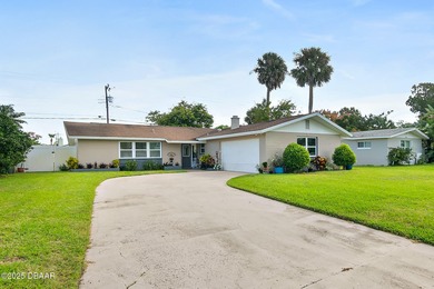 Discover the perfect blend of modern style and relaxed Florida on Daytona Beach Golf Club in Florida - for sale on GolfHomes.com, golf home, golf lot