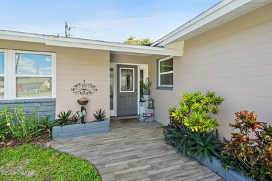 Discover the perfect blend of modern style and relaxed Florida on Daytona Beach Golf Club in Florida - for sale on GolfHomes.com, golf home, golf lot