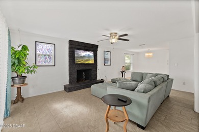 Discover the perfect blend of modern style and relaxed Florida on Daytona Beach Golf Club in Florida - for sale on GolfHomes.com, golf home, golf lot