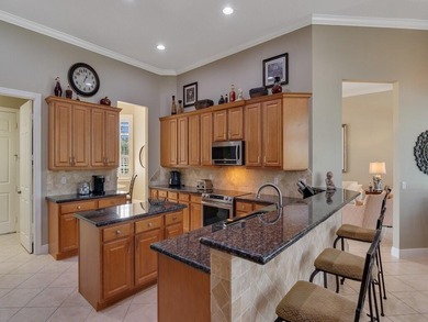 Enjoy spectacular Golf & Water views in the desirable Briarcliff on The Legacy Golf and Tennis Club in Florida - for sale on GolfHomes.com, golf home, golf lot