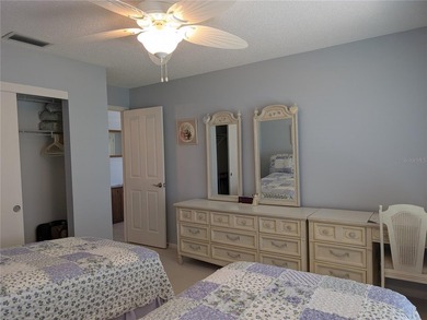 Immaculate *PHILODENDRON* w/private backyard, centrally located on Mainlands Golf Club in Florida - for sale on GolfHomes.com, golf home, golf lot