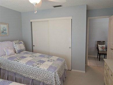 Immaculate *PHILODENDRON* w/private backyard, centrally located on Mainlands Golf Club in Florida - for sale on GolfHomes.com, golf home, golf lot