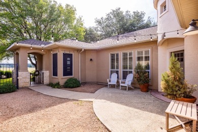 Charming garden home with lovely front courtyard sits across on The Club At Comanche Trace in Texas - for sale on GolfHomes.com, golf home, golf lot