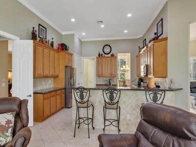 Enjoy spectacular Golf & Water views in the desirable Briarcliff on The Legacy Golf and Tennis Club in Florida - for sale on GolfHomes.com, golf home, golf lot