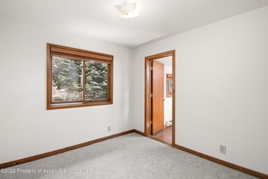 Welcome to The Ranch at Roaring Fork! This home offers one level on Ranch at Roaring Fork Golf Course in Colorado - for sale on GolfHomes.com, golf home, golf lot