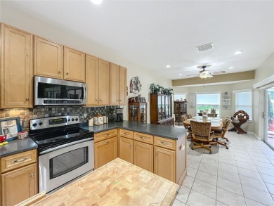 Welcome to your private retreat in the heart of the greens! This on Plantation Golf Club in Florida - for sale on GolfHomes.com, golf home, golf lot