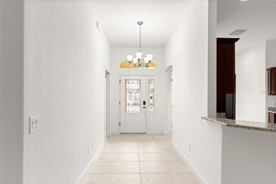 *LARGE GLASS ENCLOSED BONUS ROOM*FANTASTIC LOCATION*GOLF CART on Bella Glade Country Club in Florida - for sale on GolfHomes.com, golf home, golf lot