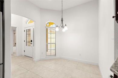 *LARGE GLASS ENCLOSED BONUS ROOM*FANTASTIC LOCATION*GOLF CART on Bella Glade Country Club in Florida - for sale on GolfHomes.com, golf home, golf lot