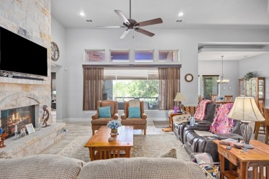 Beautiful single-family home sits overlooking the green of Hole on The Club At Comanche Trace in Texas - for sale on GolfHomes.com, golf home, golf lot