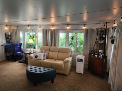 Move-in ready and fully upgraded! Check out this beautiful on Spanish Lakes Country Club in Florida - for sale on GolfHomes.com, golf home, golf lot