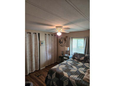 Move-in ready and fully upgraded! Check out this beautiful on Spanish Lakes Country Club in Florida - for sale on GolfHomes.com, golf home, golf lot
