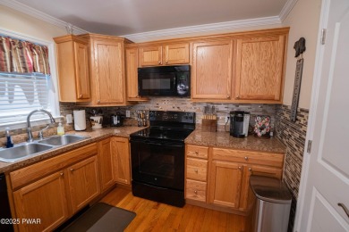 Welcome to this well-maintained ranch home in The Hideout, a on The Hideout Golf in Pennsylvania - for sale on GolfHomes.com, golf home, golf lot