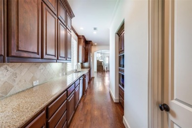 Nestled on a premier GOLF COURSE lot overlooking the tee box of on Lantana Golf Club in Texas - for sale on GolfHomes.com, golf home, golf lot