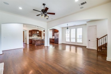 Nestled on a premier GOLF COURSE lot overlooking the tee box of on Lantana Golf Club in Texas - for sale on GolfHomes.com, golf home, golf lot