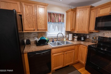 Welcome to this well-maintained ranch home in The Hideout, a on The Hideout Golf in Pennsylvania - for sale on GolfHomes.com, golf home, golf lot