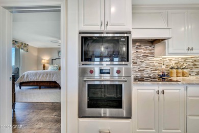 Experience FULLY FURNISHED luxury waterfront living in Panama on Bay Point Resort Golf Club in Florida - for sale on GolfHomes.com, golf home, golf lot