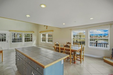 Lakefront mountain living, exceptionally priced. Single-level on Pagosa Springs Golf Club in Colorado - for sale on GolfHomes.com, golf home, golf lot