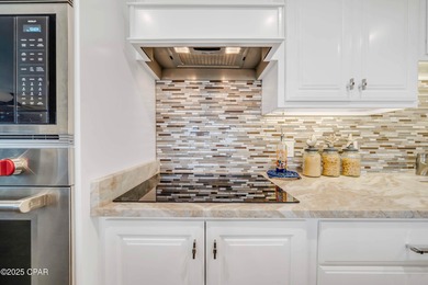 Experience FULLY FURNISHED luxury waterfront living in Panama on Bay Point Resort Golf Club in Florida - for sale on GolfHomes.com, golf home, golf lot