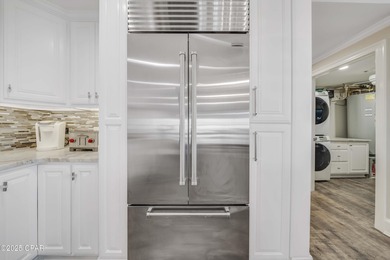 Experience FULLY FURNISHED luxury waterfront living in Panama on Bay Point Resort Golf Club in Florida - for sale on GolfHomes.com, golf home, golf lot