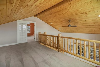 Lakefront mountain living, exceptionally priced. Single-level on Pagosa Springs Golf Club in Colorado - for sale on GolfHomes.com, golf home, golf lot