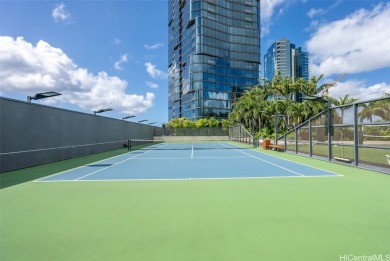 This upgraded unit boasts high-end finishes, including automated on Ala Wai Golf Course in Hawaii - for sale on GolfHomes.com, golf home, golf lot