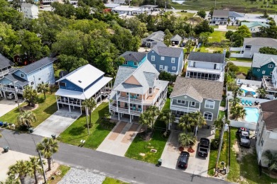 Welcome home to this beautiful, raised beach house with an on Surf Golf and Beach Club in South Carolina - for sale on GolfHomes.com, golf home, golf lot