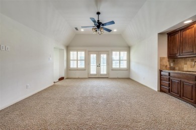 Nestled on a premier GOLF COURSE lot overlooking the tee box of on Lantana Golf Club in Texas - for sale on GolfHomes.com, golf home, golf lot