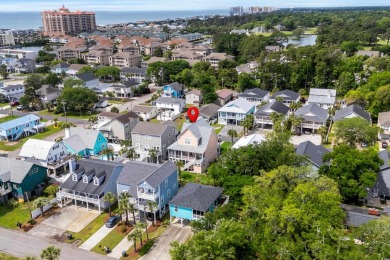 Welcome home to this beautiful, raised beach house with an on Surf Golf and Beach Club in South Carolina - for sale on GolfHomes.com, golf home, golf lot