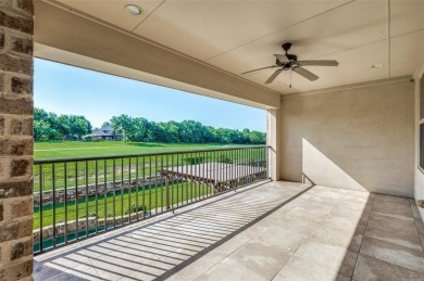 Nestled on a premier GOLF COURSE lot overlooking the tee box of on Lantana Golf Club in Texas - for sale on GolfHomes.com, golf home, golf lot
