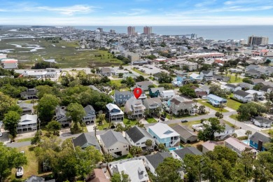 Welcome home to this beautiful, raised beach house with an on Surf Golf and Beach Club in South Carolina - for sale on GolfHomes.com, golf home, golf lot