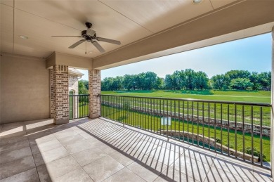 Nestled on a premier GOLF COURSE lot overlooking the tee box of on Lantana Golf Club in Texas - for sale on GolfHomes.com, golf home, golf lot