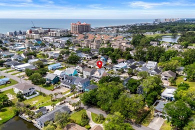 Welcome home to this beautiful, raised beach house with an on Surf Golf and Beach Club in South Carolina - for sale on GolfHomes.com, golf home, golf lot