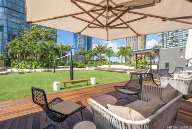 This upgraded unit boasts high-end finishes, including automated on Ala Wai Golf Course in Hawaii - for sale on GolfHomes.com, golf home, golf lot