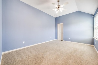 Nestled on a premier GOLF COURSE lot overlooking the tee box of on Lantana Golf Club in Texas - for sale on GolfHomes.com, golf home, golf lot